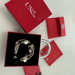 Brown leather three strand bracelet with sterling silver plated details